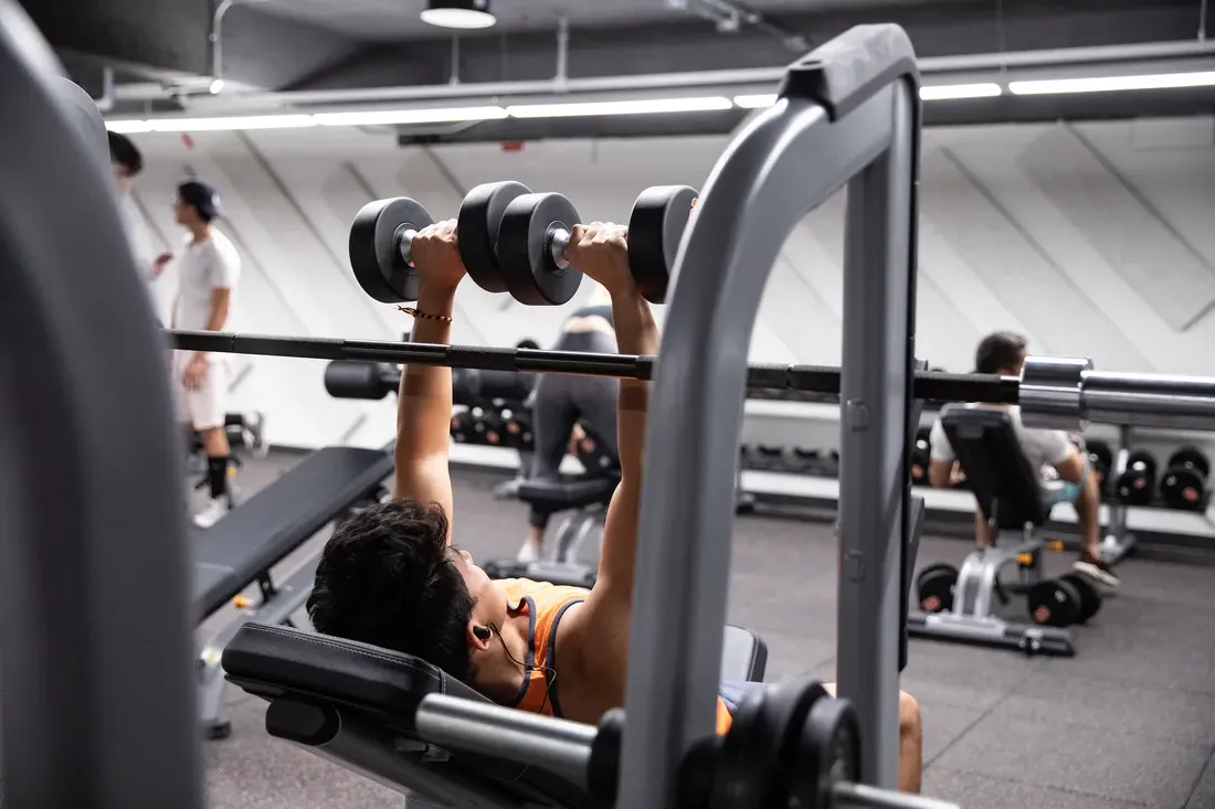 Person lifting weights.